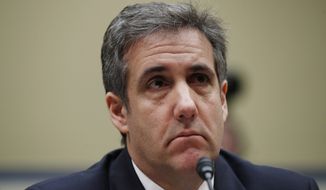 Michael Cohen, President Donald Trump&#39;s former personal lawyer, testifies before the House Oversight and Reform Committee on Capitol Hill, Wednesday, Feb. 27, 2019, in Washington. (AP Photo/Alex Brandon)