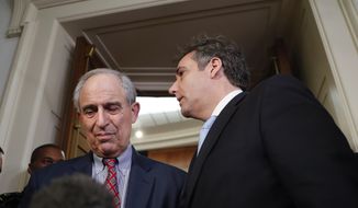 Michael Cohen, right, President Donald Trump&#39;s former lawyer, walks out after testifying to the House Oversight and Reform Committee on Capitol Hill in Washington, Wednesday, Feb. 27, 2019. Walking with Cohen is his attorney Lanny Davis, left. (AP Photo/Pablo Martinez Monsivais) **FILE**