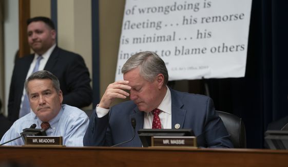 Rep. Mark Meadows, R-N.C., joined at left by Rep. Jody Hice, R-Ga., leads objections to testimony by Michael Cohen, President Donald Trump&#39;s former personal lawyer, at the House Oversight and Reform Committee about his behind-the-scenes knowledge of Trump&#39;s activities, including possible criminal conduct, on Capitol Hill in Washington, Wednesday, Feb. 27, 2019. (AP Photo/J. Scott Applewhite) ** FILE **