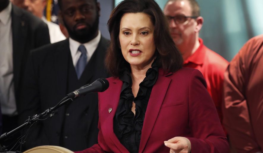 In this Tuesday, Feb. 26, 2019 photo, Michigan Gov. Gretchen Whitmer talks about the proposed new Chrysler auto plant in Detroit. Whitmer said Wednesday, Feb. 27, that Michigan's incentives for Fiat Chrysler to add 6,500 jobs in the state will not require legislative approval. She said the state will use existing economic development programs to assist the automaker's planned $4.5 billion expansion, which was announced Tuesday. (AP Photo/Carlos Osorio)