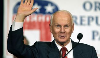 FILE - In this Nov. 8, 2016, file photo, Dennis Richardson, the Oregon Republican Secretary of state candidate, waves to the crowd during an election night event in Salem, Ore. Richardson, the highest-ranking Republican in Oregon state government, died at home Tuesday night, Feb. 26, 2019, surrounded by family and friends after a battle with brain cancer. He was 69. (AP Photo/Timothy J. Gonzalez, File)