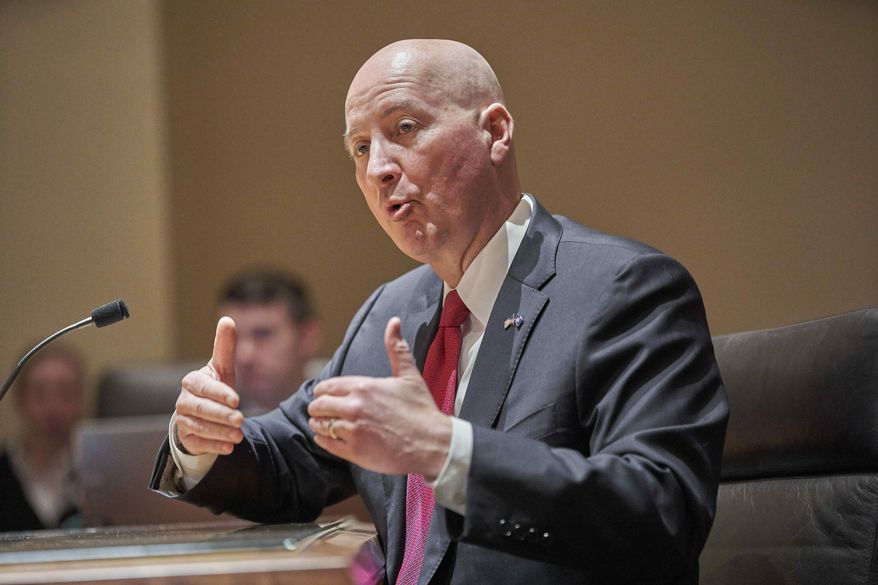 Neb. Gov. Pete Ricketts speaks in favor of during a a tax relief measure at the Legislature's Revenue Committee, in Lincoln, Neb., Wednesday, Feb. 27, 2019. Gov. Ricketts' plan to curtail sharp increases in property taxes is drawing favorable reviews from Nebraska farmers, but some rural lawmakers say more is needed to help the agriculture industry. (AP Photo/Nati Harnik)