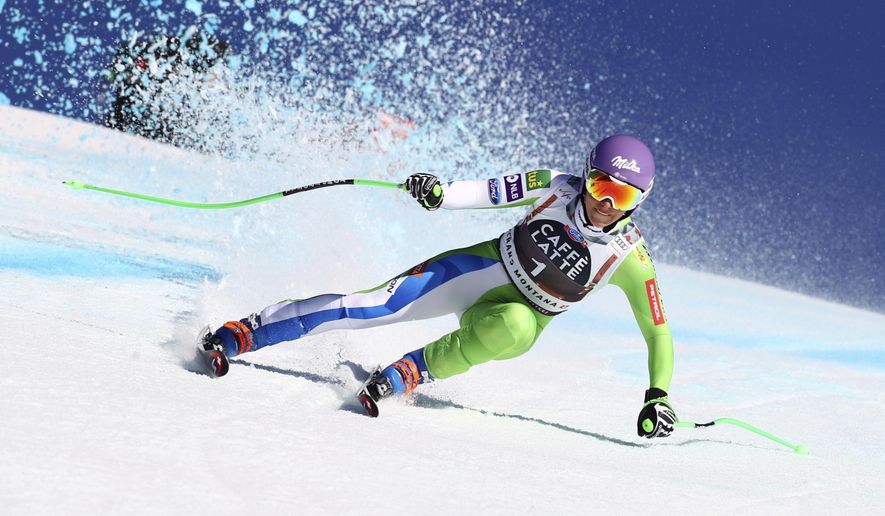 Slovenia's Ilka Stuhec speeds down the course during a women's World Cup downhill, in Crans Montana, Switzerland, Saturday, Feb. 23, 2019. (AP Photo/Marco Trovati)