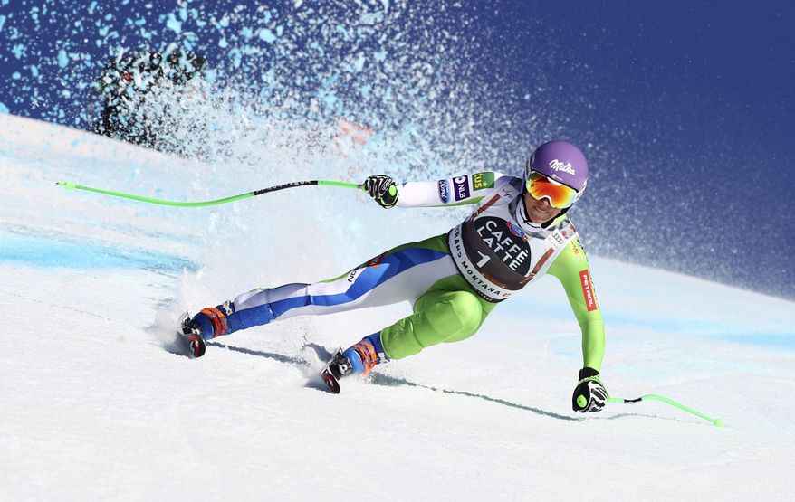 Slovenia's Ilka Stuhec speeds down the course during a women's World Cup downhill, in Crans Montana, Switzerland, Saturday, Feb. 23, 2019. (AP Photo/Marco Trovati)