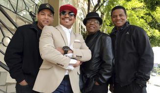 In this Tuesday, Feb. 26, 2019, Marlon Jackson, second from left, Tito Jackson, second from right, and Jackie Jackson, far right, brothers of the late musical artist Michael Jackson, and Tito&#x27;s son Taj, far left, pose together for a portrait outside the Four Seasons Hotel, in Los Angeles. Jackie, Tito, Marlon and Taj Jackson, gave the first family interviews Tuesday on “Leaving Neverland,” which features two Michael Jackson accusers and is set to air on HBO starting Sunday, March 3. (Photo by Chris Pizzello/Invision/AP)