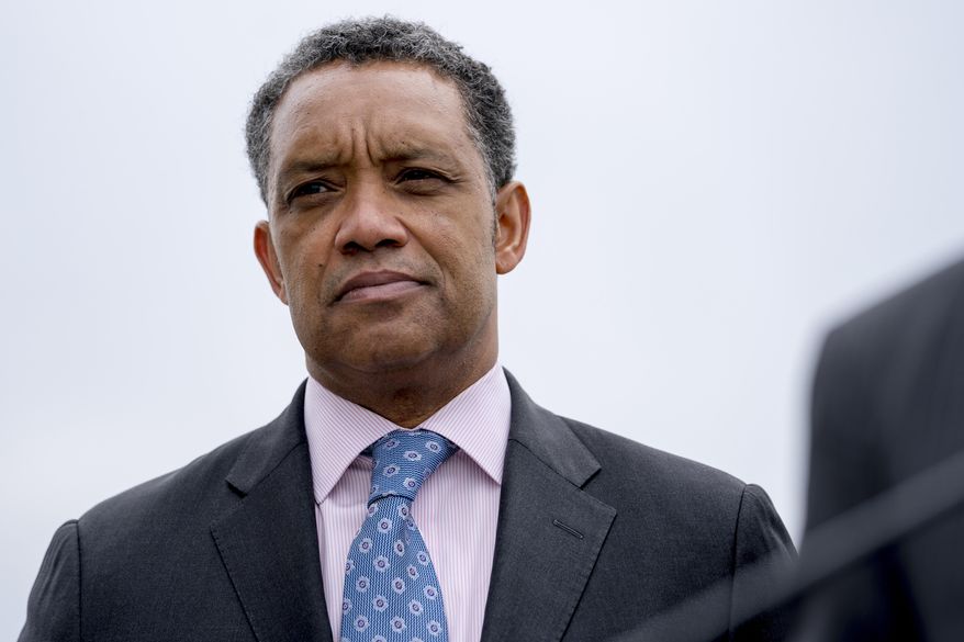 In this Feb. 26, 2018 photo, District of Columbia Attorney General Karl Racine, attends a news conference near the White House in Washington. A spokesman for President Donald Trump's inaugural committee has confirmed on Wednesday, Feb. 27, 2019, that Racine's office has subpoenaed financial records from the committee regarding the $107 million the committee raised to hold inaugural events. (AP Photo/Andrew Harnik, File) **FILE**