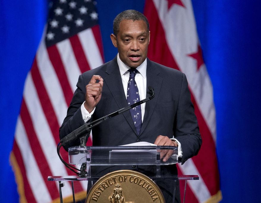 In this Jan. 2, 2015, file photo, Attorney General of the District of Columbia Karl Racine speaks during the 2015 District of Columbia Inauguration ceremony at the Convention Center in Washington. (AP Photo/Carolyn Kaster) ** FILE **