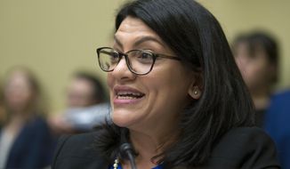 Rep. Rashida Tlaib, D-Mich., questions Michael Cohen, President Donald Trump&#39;s former lawyer, as he testifies before the House Oversight and Reform Committee, on Capitol Hill, Wednesday, Feb. 27, 2019, in Washington. (AP Photo/Alex Brandon) ** FILE **