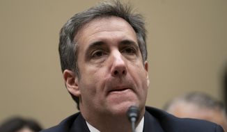 Michael Cohen, President Donald Trump&#39;s former lawyer, testifies before the House Oversight and Reform Committee, on Capitol Hill, Wednesday, Feb. 27, 2019, in Washington. (AP Photo/J. Scott Applewhite)