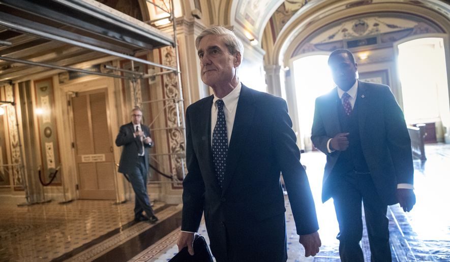 In this June 21, 2017, file photo, special counsel Robert Mueller departs after a closed-door meeting with members of the Senate Judiciary Committee about Russian meddling in the election and possible connection to the Trump campaign, at the Capitol in Washington. (AP Photo/J. Scott Applewhite, File)