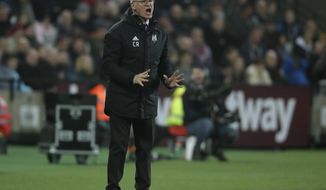 Fulham manager Claudio Ranieri gestures during the English Premier League soccer match between West Ham and Fulham at the London Stadium in London, Friday, Feb. 22, 2019. (AP Photo/Matt Dunham)