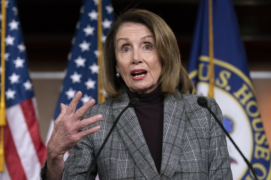 Speaker of the House Nancy Pelosi, D-Calif., meets with reporters just after the Democratic-controlled House approved a measure requiring federal background checks for all firearms sales and transfers, the first major gun control legislation considered by Congress in nearly 25 years, on Capitol Hill in Washington, Thursday, Feb. 28, 2019. (AP Photo/J. Scott Applewhite)