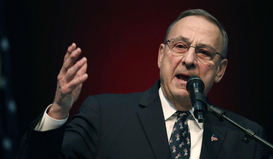 FILE- In this May 5, 2018, file photo Republican Gov.  Paul LePage speaks at the Republican Convention in Augusta, Maine. The former governor of Maine said any elimination of the Electoral College would hurt white people. LePage told WVOM-AM that allowing the popular vote to choose the president would give minorities more power and that “white people will not have anything to say.” Proposals to eliminate the Electoral College are often floated but fail to gain traction. A Maine legislative committee plans to discuss a proposal this week.  (AP Photo/Robert F. Bukaty, File)