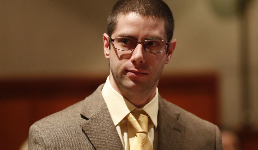 John Williams, who is accused of killing Somerset County Cpl. Eugene Cole last year, appears at a hearing, Thursday, Feb. 28, 2019, in Portland, Maine. The hearing is on a defense motion to suppress Williams' confession in the case. His attorney has contended Williams was beaten and suffering from opioid withdrawal when he spoke to police after the April 25, 2018 killing. (AP Photo/Robert F. Bukaty)
