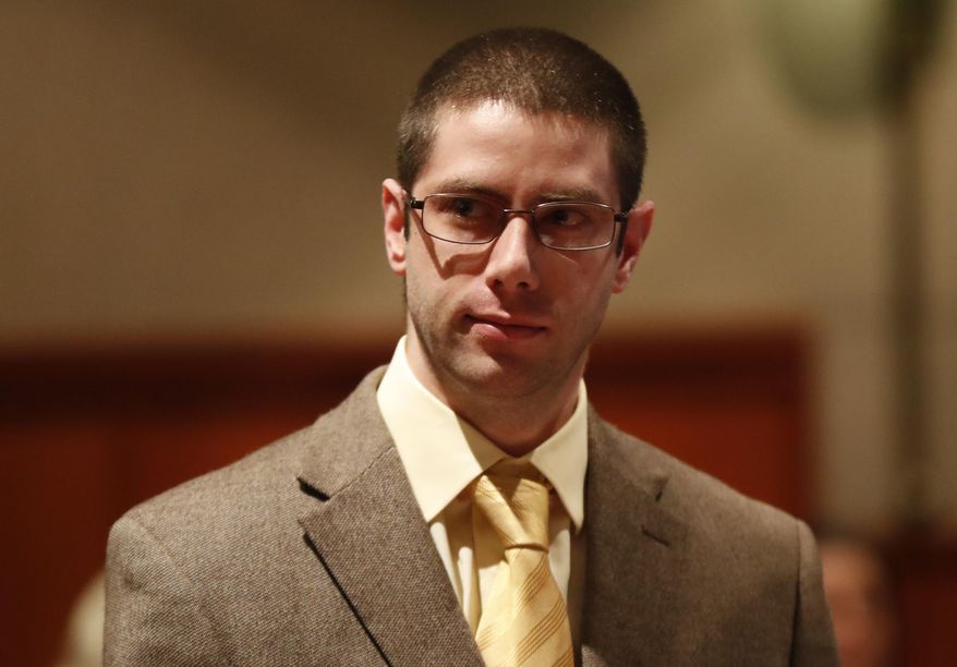 John Williams, who is accused of killing Somerset County Cpl. Eugene Cole last year, appears at a hearing, Thursday, Feb. 28, 2019, in Portland, Maine. The hearing is on a defense motion to suppress Williams' confession in the case. His attorney has contended Williams was beaten and suffering from opioid withdrawal when he spoke to police after the April 25, 2018 killing. (AP Photo/Robert F. Bukaty)