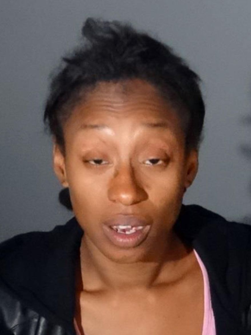 FILE - This undated file booking photo provided by the Culver City, Calif., Police Department shows Kianna Williams. Los Angeles County prosecutors have filed charges against Williams and Adam Manson, the parents of a missing baby who is presumed dead. They were each charged Wednesday, Feb. 27, 2019, with one count of child abuse resulting in death. (Culver City Police Department via AP, File)