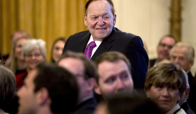 FILE - In this Nov. 16, 2018, file photo, Las Vegas Sands Corporation Chief Executive and Republican mega donor Sheldon Adelson, stands as he is recognized by President Donald Trump during a Medal of Freedom ceremony in the East Room of the White House in Washington. Casino magnate and GOP donor Adelson is not in good health and has not being at his company&#x27;s offices in Las Vegas since around Christmas Day. Las Vegas Sands Corp. on Thursday, Feb. 28, 2019, did not immediately respond to a request for comment. Attorney James Jimmerson told the court the condition of the 85-year-old billionaire is dire. (AP Photo/Andrew Harnik, File)