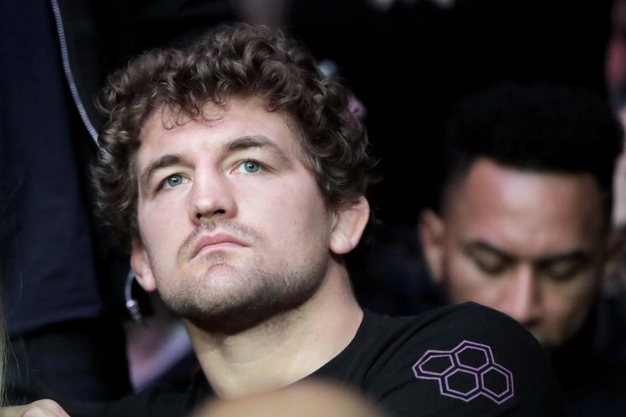 FILE - In this Nov. 3, 2018, file photo, UFC fighter Ben Askren waits for the start of a middleweight mixed martial arts bout between David Branch and Jared Cannonier at UFC 230, in New York. Askren is finally making his UFC debut after a decade in mixed martial arts and a lifetime of wrestling. (AP Photo/Julio Cortez, File)