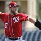 Washington Nationals pitcher Stephen Strasburg throws during the first inning of an exhibition spring training baseball game against the Miami Marlins Friday, March 1, 2019, in Jupiter, Fla. (AP Photo/Jeff Roberson)