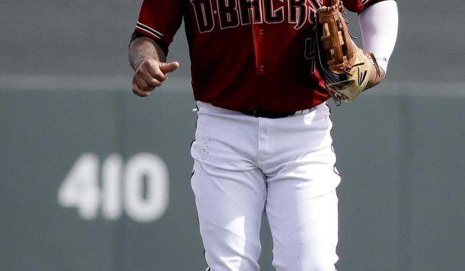 Arizona Diamondbacks center fielder Ketel Marte runs in from the outfield during the first inning of a spring baseball game against the Oakland Athletics in Scottsdale, Ariz., Monday, Feb. 25, 2019. (AP Photo/Chris Carlson)