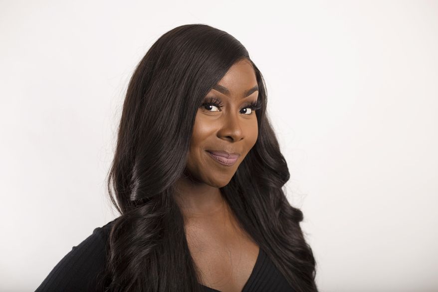 This Sept. 26, 2018, file photo released by BET shows Jessie Woo, a singer, TV host and cast member of VH1’s “Love & Hip Hop Miami." The budding vocalist met a successful producer who said he wanted to help her with her music then she says she was raped by music producers. (Evans Alexandre/BET via AP)