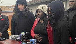 CORRECTS BYLINE TO KATHLEEN RONAYNE INSTEAD OF RICH PEDRONCELLI - Sequette Clark, center, the mother of police shooting victim Stephon Clark, discusses the decision not to prosecute the two Sacramento Police officers involved, during a news conference in Sacramento, Calif., Saturday, March 2, 2019. Sacramento County District Attorney Anne Marie Schubert said that Officers Terrance Mercadal and Jared Robinet did not break any laws when they shot Stephon Clark, 22, and no charges will be filed against them. (AP Photo/Kathleen Ronayne)