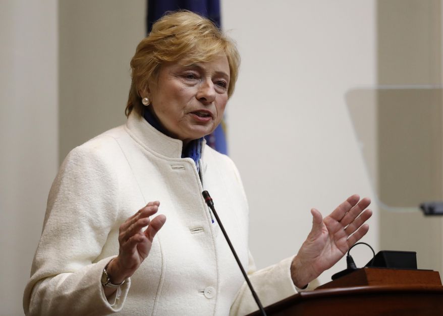 In this Feb. 11, 2019, file photo, Gov. Janet Mills delivers her State of the Budget address to the Legislature at the State House in Augusta, Maine. (AP Photo/Robert F. Bukaty, File) ** FILE **