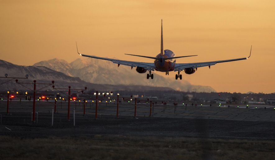 In this Feb. 24, 2019 photo, a plane takes off at Salt Lake City International Airport in Salt Lake City, Utah. Planes at Salt Lake City International Airport hit 280 birds last year, including one incident in which a flock of birds hit a plane carrying 223 passengers and narrowly missed hitting the engine. (Leah Hogsten/The Salt Lake Tribune via AP)