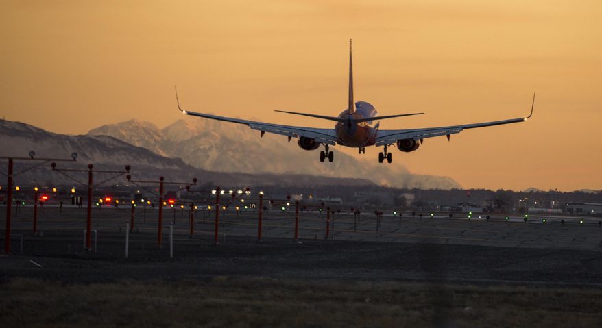 In this Feb. 24, 2019 photo, a plane takes off at Salt Lake City International Airport in Salt Lake City, Utah. Planes at Salt Lake City International Airport hit 280 birds last year, including one incident in which a flock of birds hit a plane carrying 223 passengers and narrowly missed hitting the engine. (Leah Hogsten/The Salt Lake Tribune via AP)
