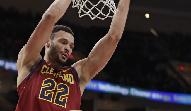 Cleveland Cavaliers&#x27; Larry Nance Jr. dunks against the Orlando Magic in the first half of an NBA basketball game, Sunday, March 3, 2019, in Cleveland. (AP Photo/Tony Dejak)
