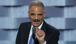 In this July 26, 2016, file photo, former Attorney General Eric Holder speaks during the second day of the Democratic National Convention in Philadelphia. (AP Photo/J. Scott Applewhite) ** FILE **