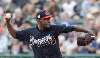 Atlanta Braves&#39; Julio Teheran pitches against the Houston Astros in the second inning of a spring baseball exhibition game, Monday, March 4, 2019, in Kissimmee, Fla. (AP Photo/John Raoux)