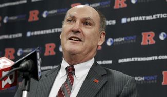 FILE - In this Nov. 20, 2012, file photo, Big Ten Conference Commissioner Jim Delany answers a question during a news conference, at Rutgers University in Piscataway, N.J. Delany, one of the most influential figures in college athletics for three decades, will step down as Big Ten commissioner when his contract expires June 30, 2020. The Big Ten announced Delany’s plans on Monday, March 4, 2019. The 71-year-old has been commissioner since 1989. (AP Photo/Mel Evans, File)