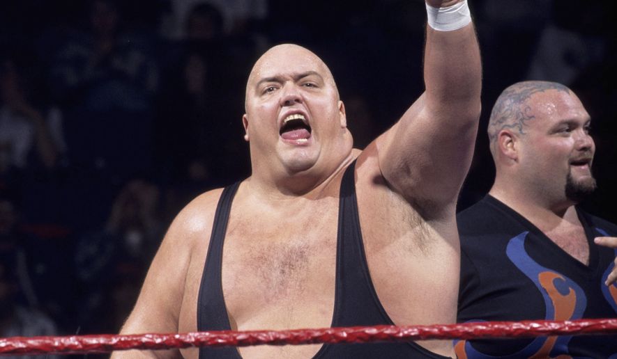 This image provided by the WWE shows professional wrestler King Kong Bundy. Promoter and longtime friend David Herro says Bundy, whose real name was Christopher Pallies, died on Monday, March 4, 2019. The 6-foot-4 (1.93 meters), 458-pound (208-kilogram) wrestler made his World Wrestling Federation debut in 1981 and was best known for facing Hulk Hogan in 1986 in a steel cage match at WrestleMania 2. (WWE via AP)