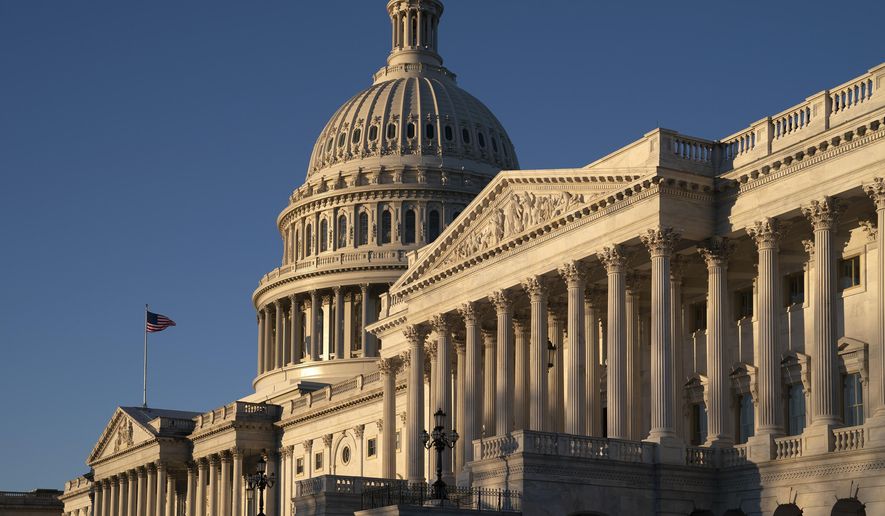 FILE- This Feb. 25, 2019, file photo shows the Capitol in Washington. On Tuesday, March 5, the Treasury Department releases federal budget data for January. (AP Photo/J. Scott Applewhite, File)