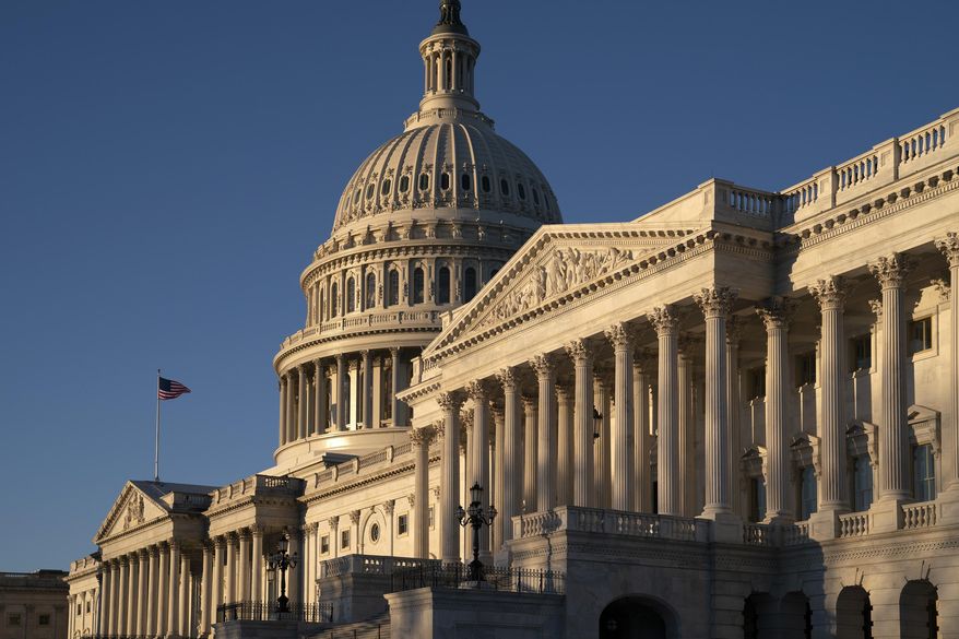 FILE- This Feb. 25, 2019, file photo shows the Capitol in Washington. On Tuesday, March 5, the Treasury Department releases federal budget data for January. (AP Photo/J. Scott Applewhite, File)