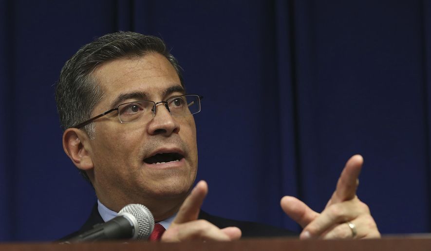 California Attorney General Xavier Becerra discusses the decision that his office will not file charges against the two Sacramento Police officers in last years fatal shooting of Stephon Clark, during a news conference, Tuesday, March 5, 2019, in Sacramento, Calif. (AP Photo/Rich Pedroncelli) ** FILE **