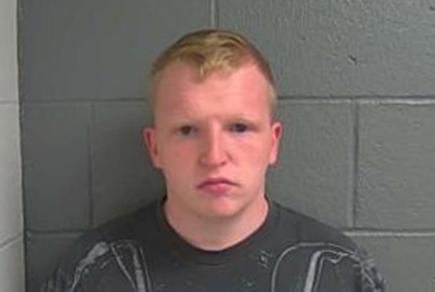 This Dec. 12, 2017 booking photo released by Callaway County, Mo., Sheriff's Office shows Michael James Collins, who was was sentenced Monday, March 4, 2019, to 15 years in prison without parole for sex crimes involving a 13-year-old Alabama girl who was brought to Missouri by the his mother and grandmother. (Callaway County Sheriff's Office via AP)