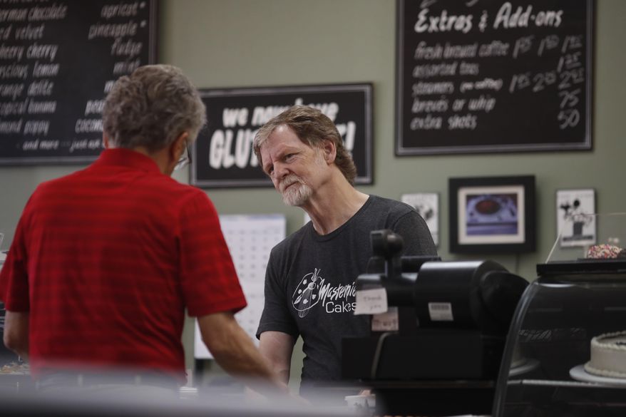 File - In this June 4, 2018, file photo, baker Jack Phillips, owner of Masterpiece Cakeshop, manages his shop in Lakewood, Colo. The state of Colorado and Phillips who refuses to make wedding cakes for gay and transgender customers on religious grounds have agreed to end their legal fight. A statement from the Colorado Attorney General's office on Tuesday, March 5, 2019, announced that the state and cakeshop owner Jack Phillips mutually agreed to end litigation in state and federal courts. (AP Photo/David Zalubowski, File)