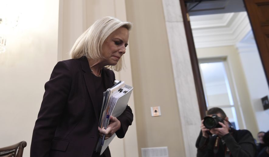 In this file photo, Kirstjen Nielsen arrives to testify on Capitol Hill in Washington, Wednesday, March 6, 2019, before the House Homeland Security Committee. (AP Photo/Susan Walsh)