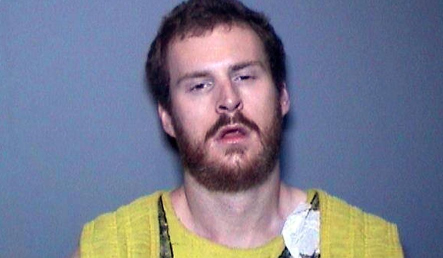 This Feb. 2019 booking photo released by the Orange County District Attorney's Office shows Camden Nicholson. The Southern California man charged with murdering his parents and their housekeeper in an affluent beach community called police and confessed, according to police documents obtained by The Associated Press. The documents say Nicholson of Newport Beach, Calif., placed the call last month before entering a hospital, where he told a police officer he killed his parents because he didn't want to be sent to a psychiatric hospital. (Orange County District Attorney's Office via AP)