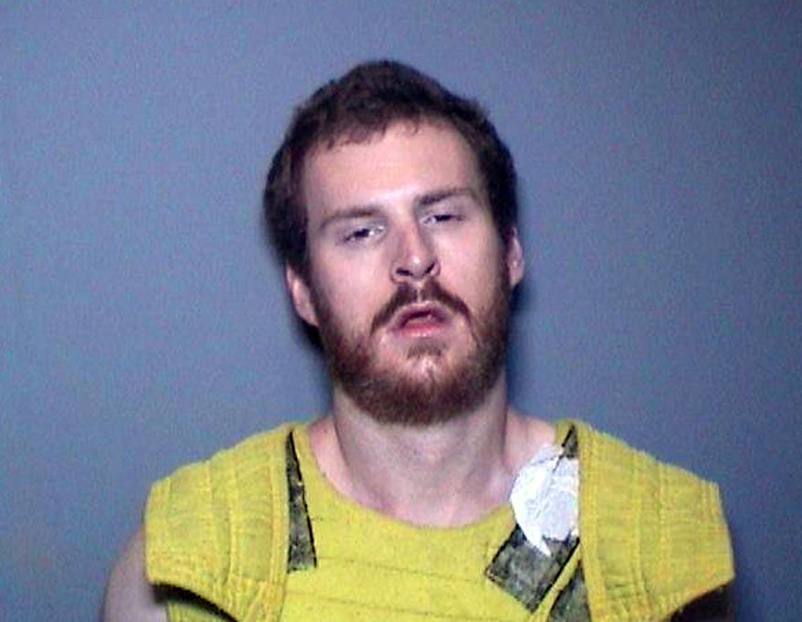 This Feb. 2019 booking photo released by the Orange County District Attorney's Office shows Camden Nicholson. The Southern California man charged with murdering his parents and their housekeeper in an affluent beach community called police and confessed, according to police documents obtained by The Associated Press. The documents say Nicholson of Newport Beach, Calif., placed the call last month before entering a hospital, where he told a police officer he killed his parents because he didn't want to be sent to a psychiatric hospital. (Orange County District Attorney's Office via AP)