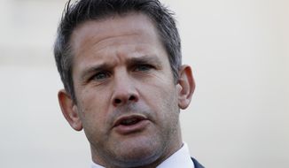 Rep. Adam Kinzinger, R-Ill., speaks to the media, Wednesday, March 6, 2019, at the White House in Washington. (AP Photo/Jacquelyn Martin) 