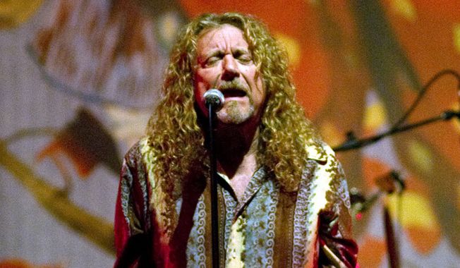 Musician Robert Plant performs in Little Rock, Ark. Thursday July 15, 2010. (AP Photo/Brian Chilson)