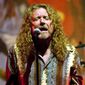 Musician Robert Plant performs in Little Rock, Ark. Thursday July 15, 2010. (AP Photo/Brian Chilson)