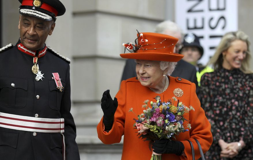 Britain's Queen Elizabeth II reacts during a visit to the Science Museum in London, Thursday March 7, 2019. The Science Museum will announce Thursday, its upcoming exhibitions for summer 2019. (Simon Dawson/Pool via AP)