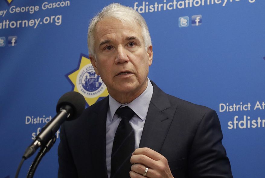FILE - In this Feb. 21, 2018, file photo, San Francisco District Attorney George Gascon speaks at news conference in San Francisco. A Northern California lawmaker and district attorney are seeking to automatically clear some 8 million criminal convictions eligible for sealing but remain public records. San Francisco District Attorney George Gascon and state Democratic Assemblyman Phil Ting of San Francisco a proposed a bill Thursday, March 7, 2019, to automatically take advantage of an often overlooked California law allowing convicted drunken drivers, burglars and other low-level offenders to seal their records. (AP Photo/Jeff Chiu, File)