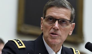 Then-U.S. Central Command Commander Gen. Joseph Votel testifies before the House Armed Services Committee on Capitol Hill in this file photo dated Thursday, March 7, 2019. Mr. Votel, now retired, has filed lawsuits against several military housing companies for a 2017 fire that destroyed his family&#39;s housing quarters on base in Tampa. (AP Photo/Susan Walsh) **FILE**