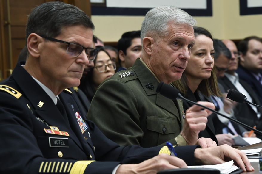 U.S. Africa Command Commander Gen. Thomas Waldhauser, center, flanked by U.S. Central Command Commander Gen. Joseph Votel, left, and Acting Assistant Secretary of Defense for International Security Affairs Kathryn Wheelbarger, right, testifies before the House Armed Services Committee on Capitol Hill in Washington, Thursday, March 7, 2019. (AP Photo/Susan Walsh)