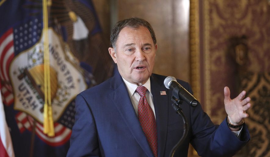 File - In this Sept. 12, 2018 file photo, Utah Gov. Gary Herbert gestures during a news conference at the Utah State Capitol in Salt Lake City. Gov. Gary Herbert said Thursday, Feb. 28, 2019, that he backs a legislative push to ban some types of gay conversion therapy that he called "barbaric" but added that defining what constitutes conversion therapy is vital. (AP Photo/Rick Bowmer, File)